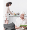 senior-woman-reading-book-front-woman-doing-housekeeping-work